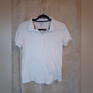 White short sleeve polo top.